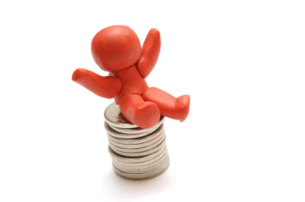 happy character sitting mountain coins